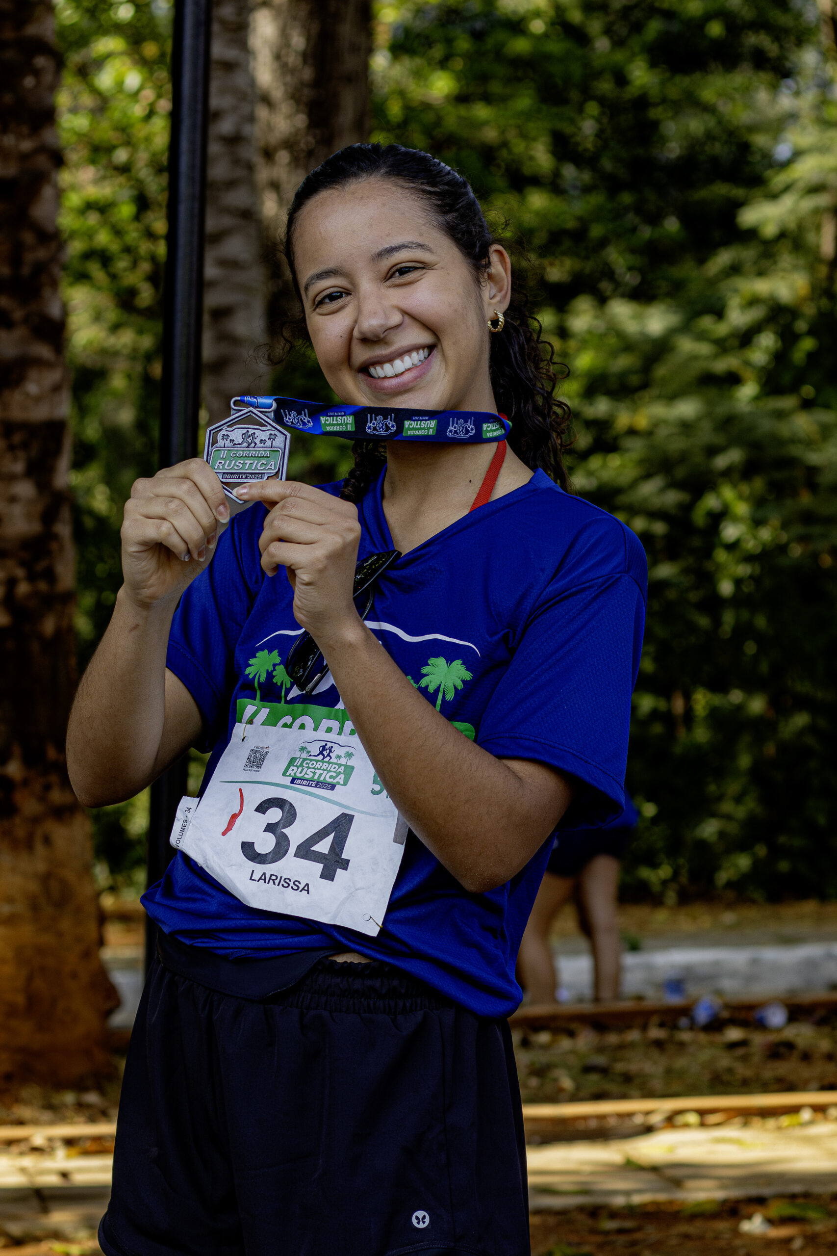 Atletas com medalha da Corrida Rústica